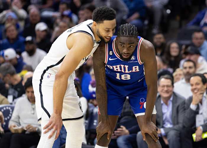 Nets forward Ben Simmons defends 76ers guard Shake Milton